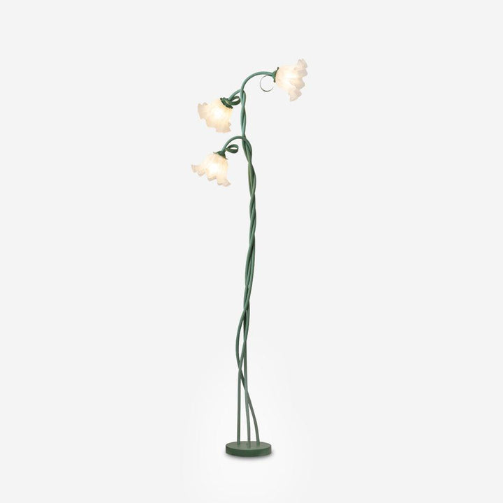 Lámpara de pie floral, pantalla con motivos verdes. Iluminación de diseño para salón.