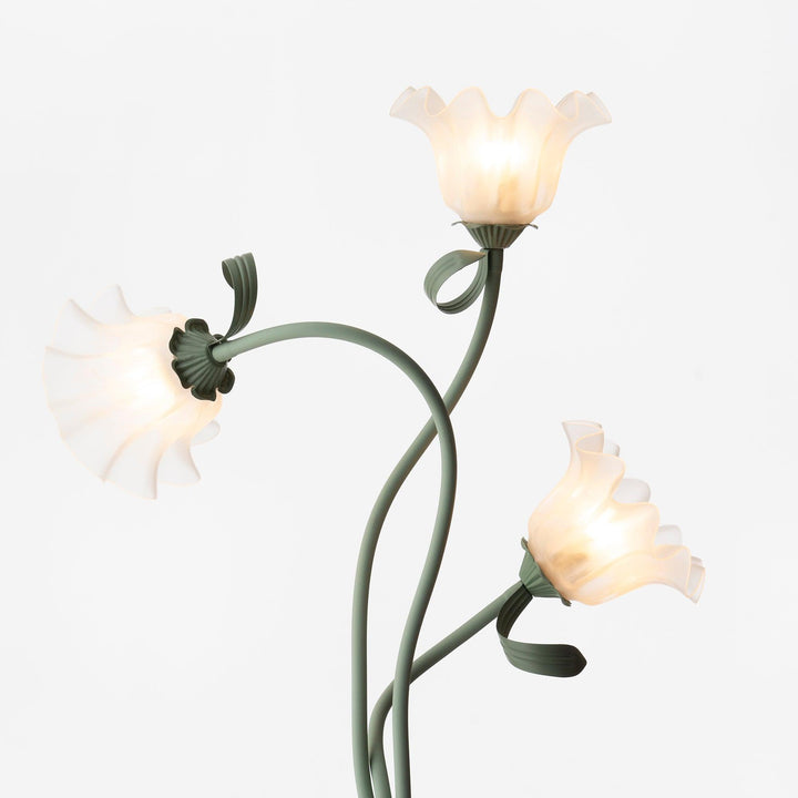 Iluminación decorativa: Lámpara de pie floral verde, diseño moderno para cualquier espacio.