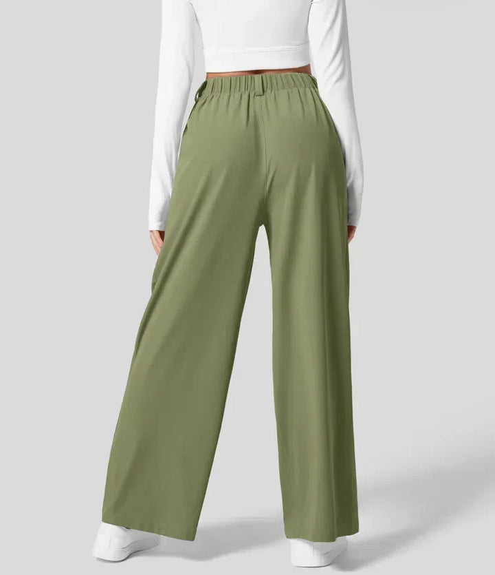 Pantalón largo de mujer con cintura alta, corte ancho, estilo chic y versátil.
