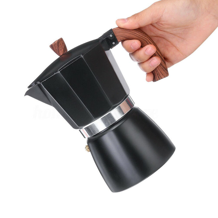Cafetera espresso italiana clásica de aluminio para hogar, preparación fácil de café.