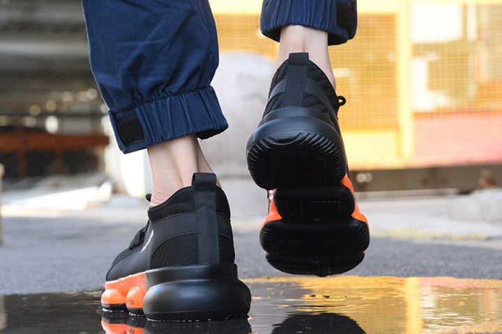 Zapatillas de seguridad cómodas y resistentes para hombres, protección duradera en trabajo y obra.