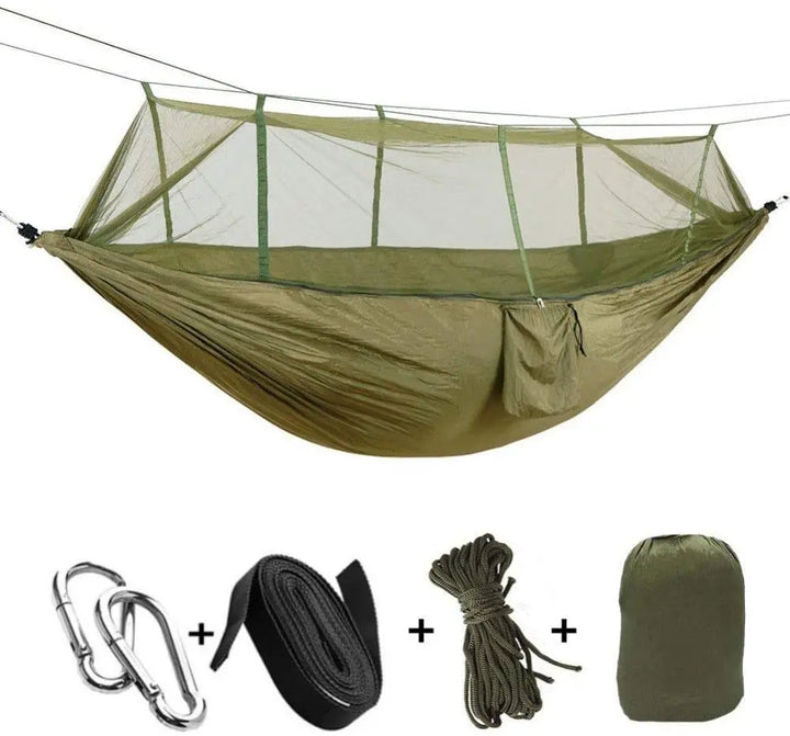 Hamaca de camping plegable con mosquitera integrada, rápida de instalar para tu viaje o excursión.