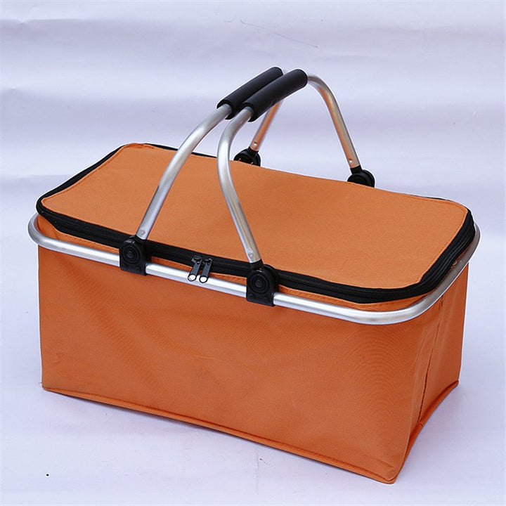 Nevera térmica portátil de gran capacidad para picnic familiar. Fácil de transportar, asegura frescura en tus salidas.