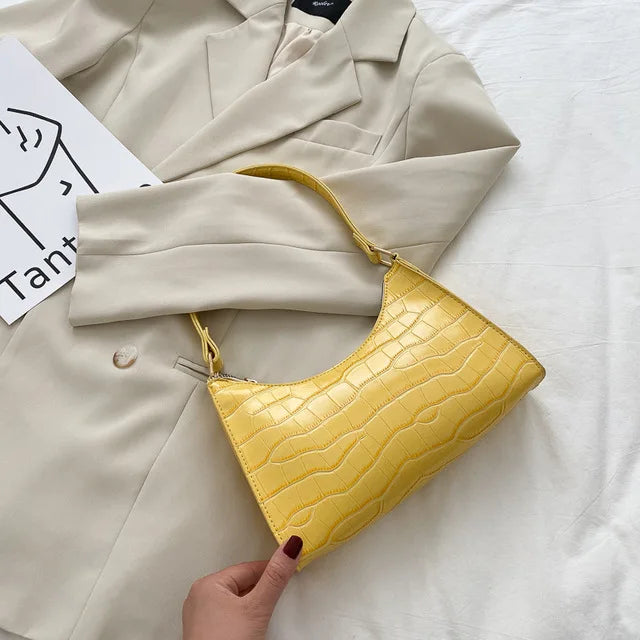 Cartera de piel de cocodrilo brillante, accesorio de moda femenina, diseño único.