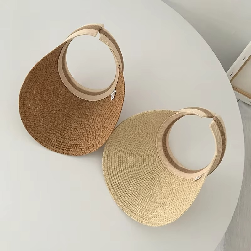 Sombrero de sol unisex con alta protección UV, accesorio esencial para días de verano en la playa.
