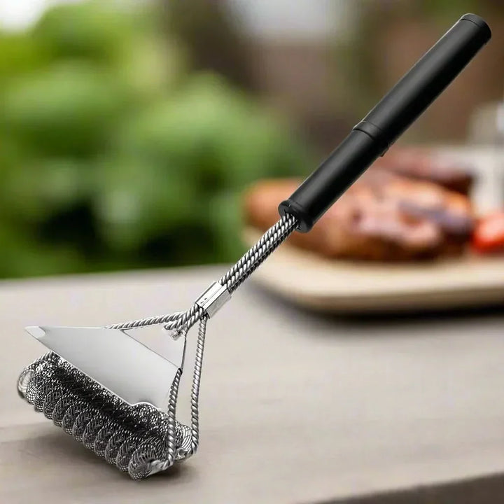 Cepillo limpiador de parrilla sin cerdas, con diseño ergonómico para una limpieza profunda y segura del asador.