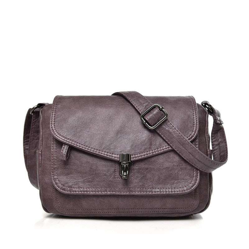 Bolso bandolera minimalista para mujer, compacto y versátil, perfecto para esenciales y viajes.