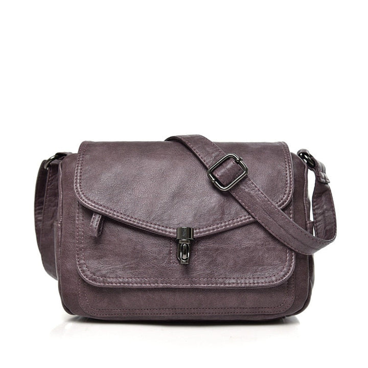Bolso bandolera minimalista para mujer, compacto y versátil, perfecto para esenciales y viajes.