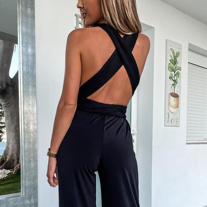 Mono de moda femenina, escote cruzado y pierna ancha. Diseño casual chic, cómodo para primavera y verano.