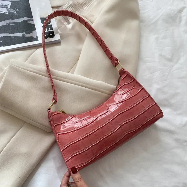 Bolso mujer piel de cocodrilo brillante, hombro, elegante y chic.