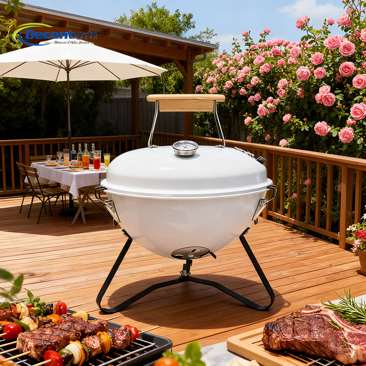 Grill de carbón pequeño con asa de transporte, fácil de llevar al aire libre.