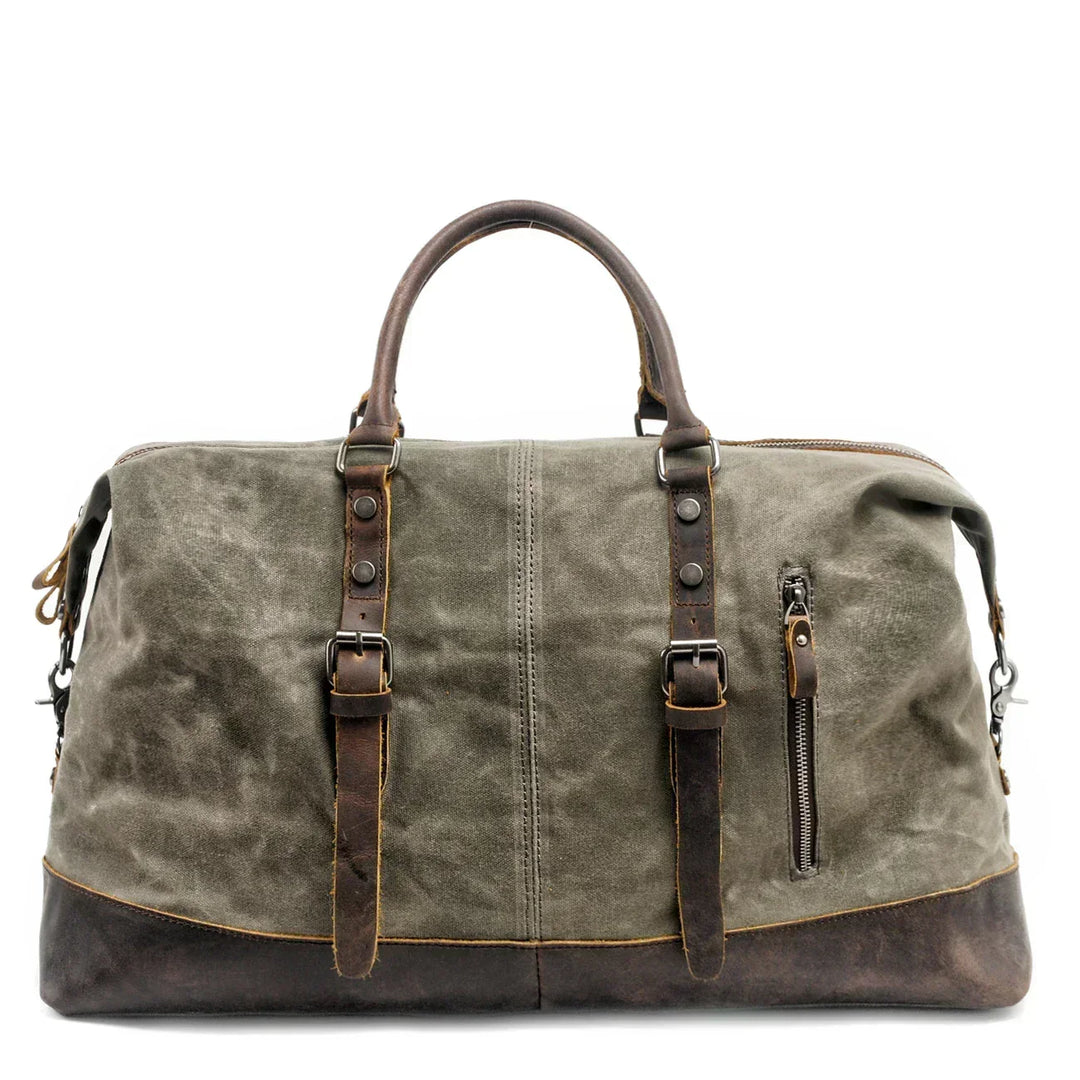 Bolso de viaje weekender de lona, resistente al agua, lleno y listo para tu próxima aventura.