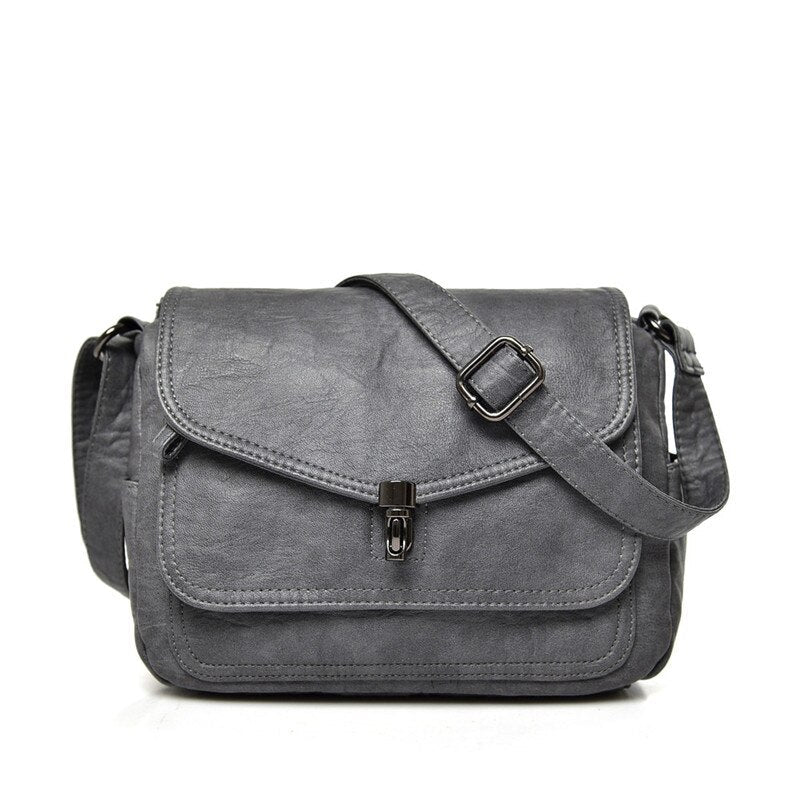Bolso de mujer ajustable y compacto, ideal para viaje o uso diario, estilo moderno y versátil.