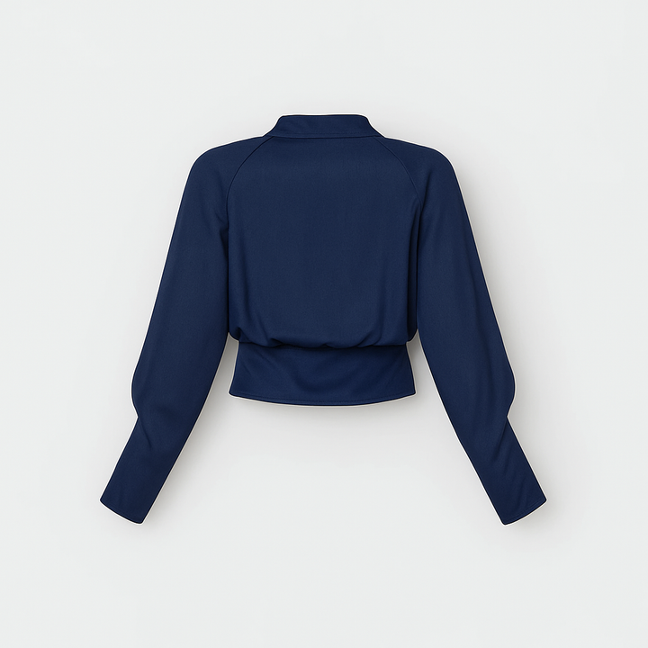 Top de mujer elegante y versátil con mangas abullonadas, apto para la oficina o estilo casual chic.