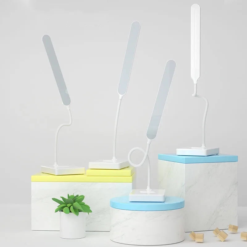 Lámpara de mesa LED con cuidado ocular, recargable por USB. Iluminación regulable, táctil y portátil, con soporte para móvil.