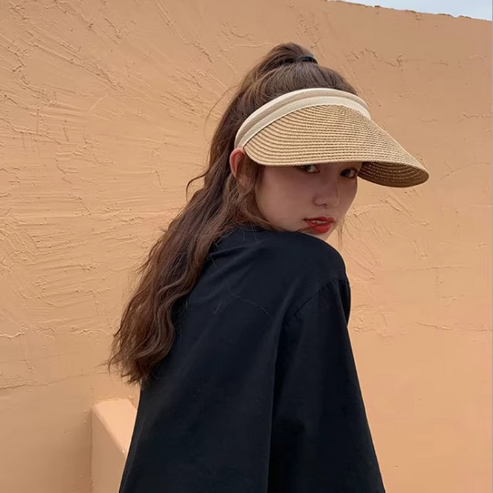 Accesorio de moda: sombrero visera de paja ajustable con ala ancha y protección solar UV para el verano.