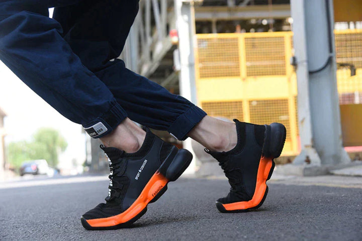 Modernas zapatillas de seguridad para hombres, calzado robusto y antideslizante para protección laboral.