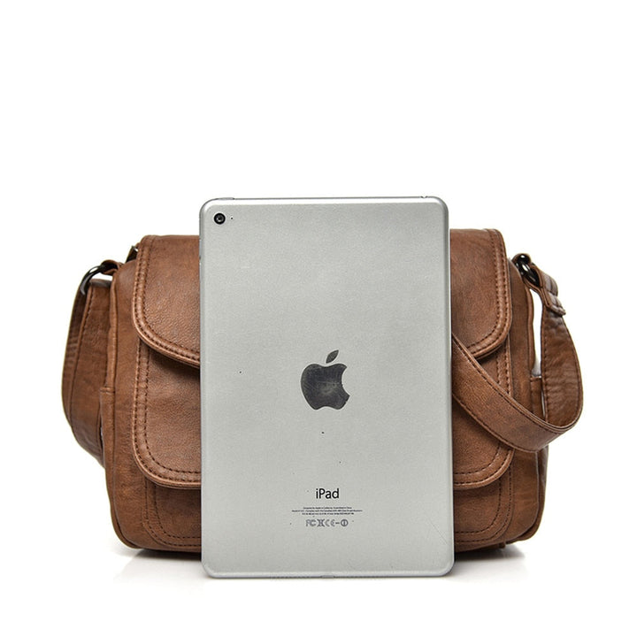 Elegante bolso bandolera de mujer, diseño chic y minimalista, ideal para complementar cualquier atuendo.