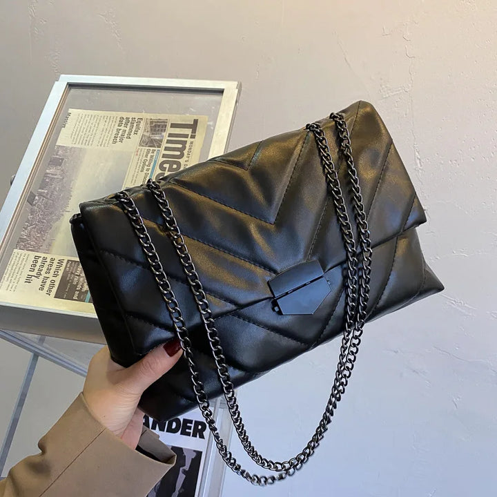 Bolso de hombro moderno para mujer, estilo sofisticado. Complemento elegante para cualquier atuendo diario.