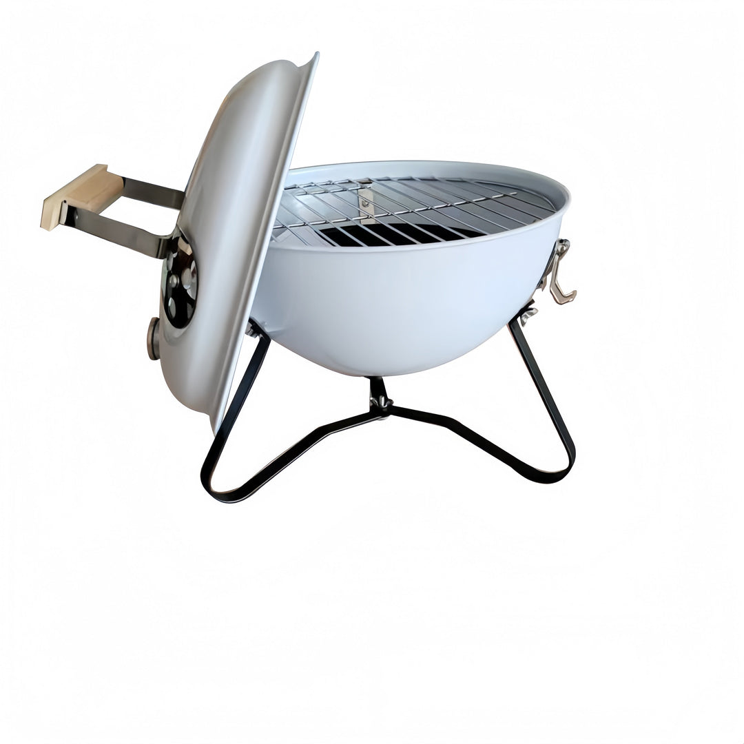 Parrilla de carbón compacta para camping, disfruta del sabor ahumado.