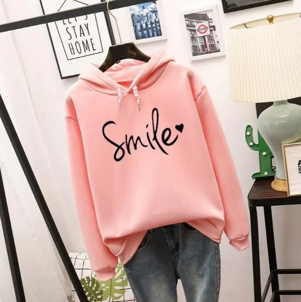 Moderna sudadera de mujer con capucha y estampado divertido de sonrisa. Perfecta para un look casual y abrigado.