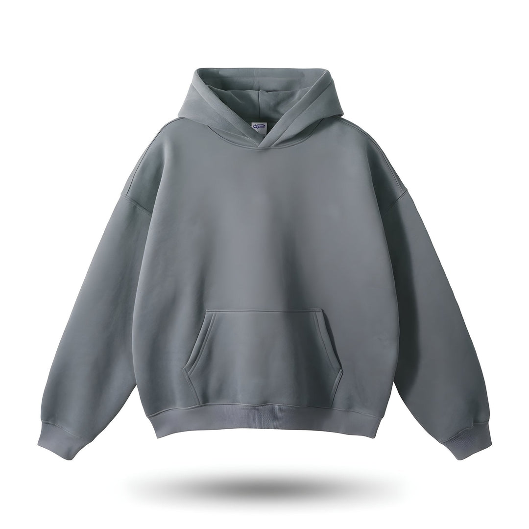 Sudadera unisex con capucha holgada y estilo urbano casual, ideal para streetwear. Comodidad para hombre y mujer.