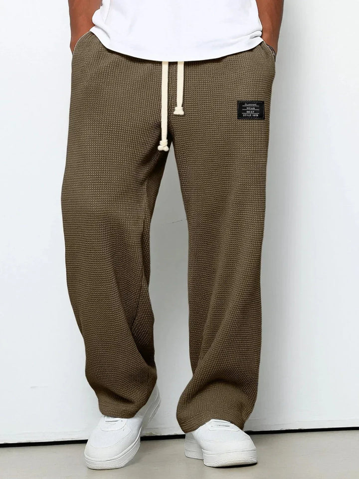 Pantalón ancho casual con cintura ajustable, garantiza comodidad y un ajuste perfecto para cada persona.