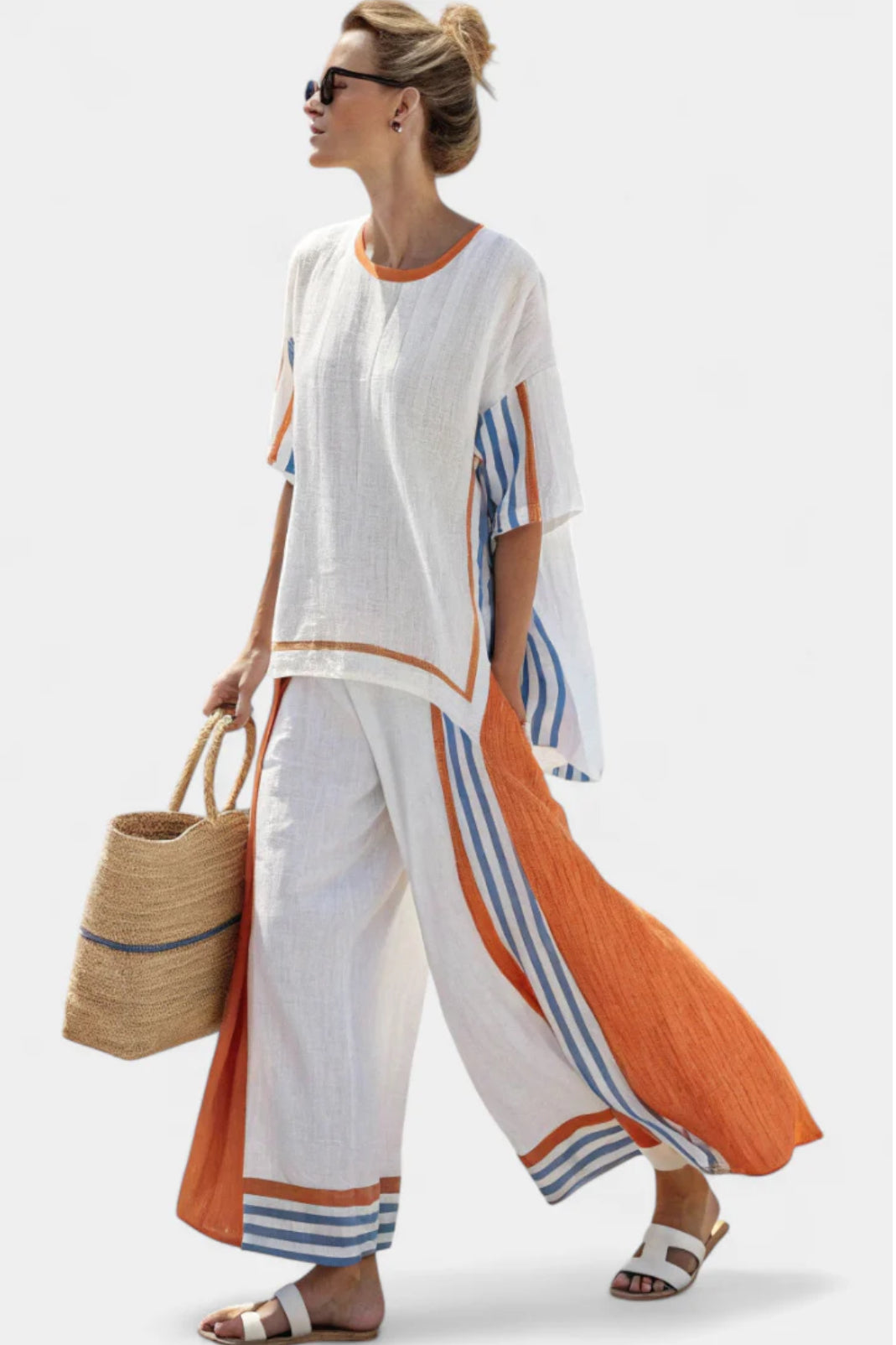 Conjunto elegante rayado de dos piezas para mujer, ideal para moda de verano o viaje casual.