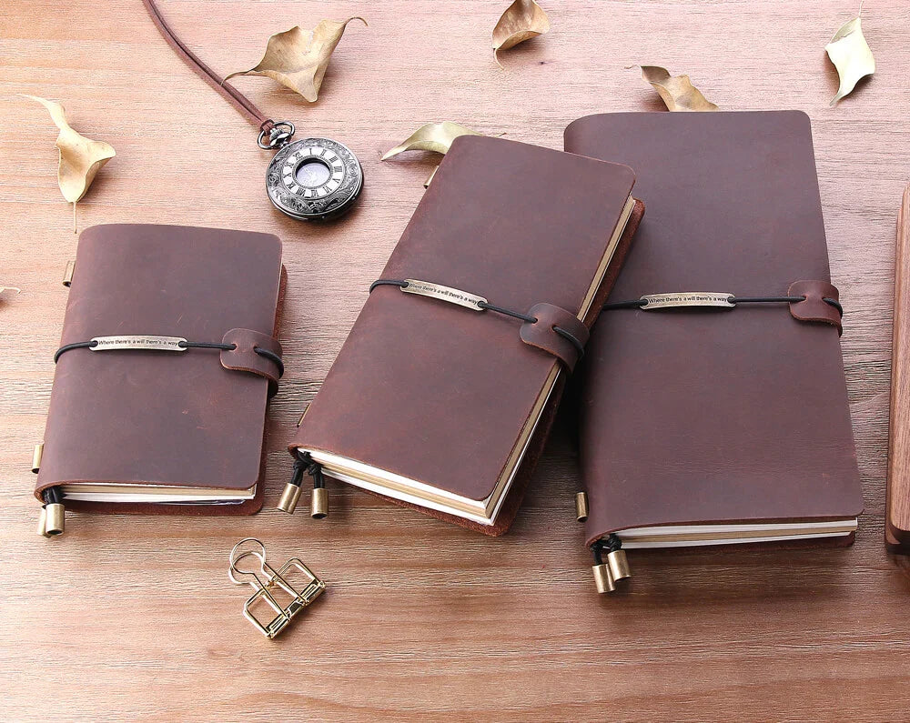 Cuaderno de viaje de cuero genuino, portátil y recargable, para registrar ideas y organizar tu día.
