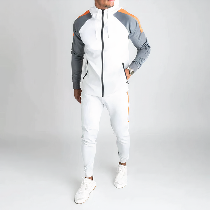 Chándal deportivo de hombre con cremallera y ajuste atlético. Ideal para entrenamiento y estilo casual de invierno.