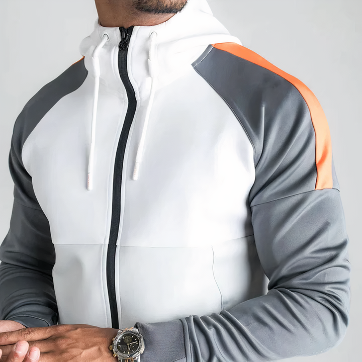 Ropa deportiva de hombre: chándal con cremallera y ajuste atlético. Perfecto para entrenar o uso casual en invierno.