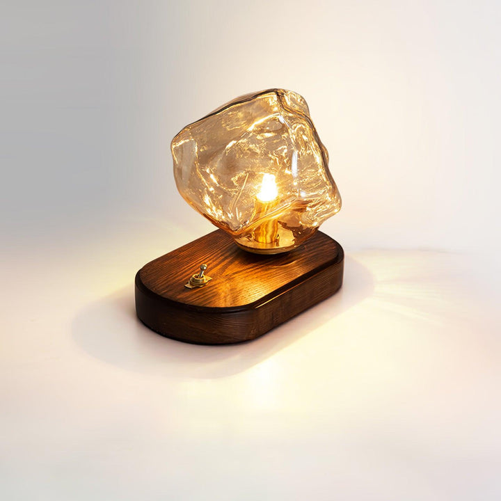 Lámpara de mesa Averis de cristal, luz suave. Transforma tu oficina o salón con diseño moderno.