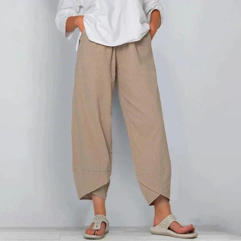 Pantalón unisex de lino y algodón, versátil y elegante. Diseño con cintura elástica y bolsillos para comodidad.