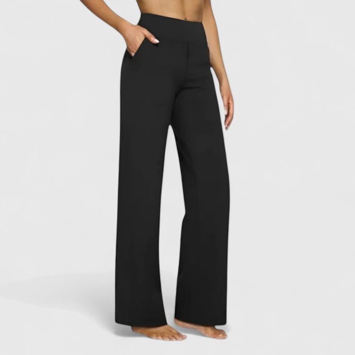 Estiloso pantalón ancho elástico para mujer. Diseño de tiro alto con bolsillos, comodidad todo el día.