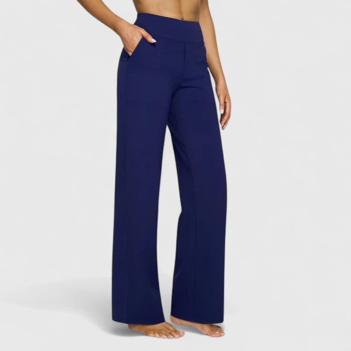 Look cómodo: pantalón ancho de mujer con tiro alto elástico y prácticos bolsillos.