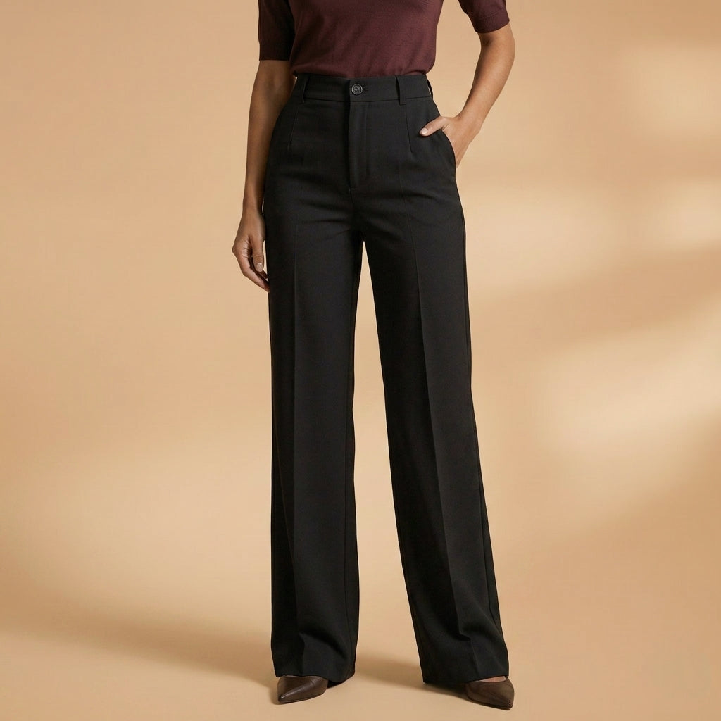 Silueta elegante con pantalones de tiro alto y pierna ancha, ideal para moda casual mujer.