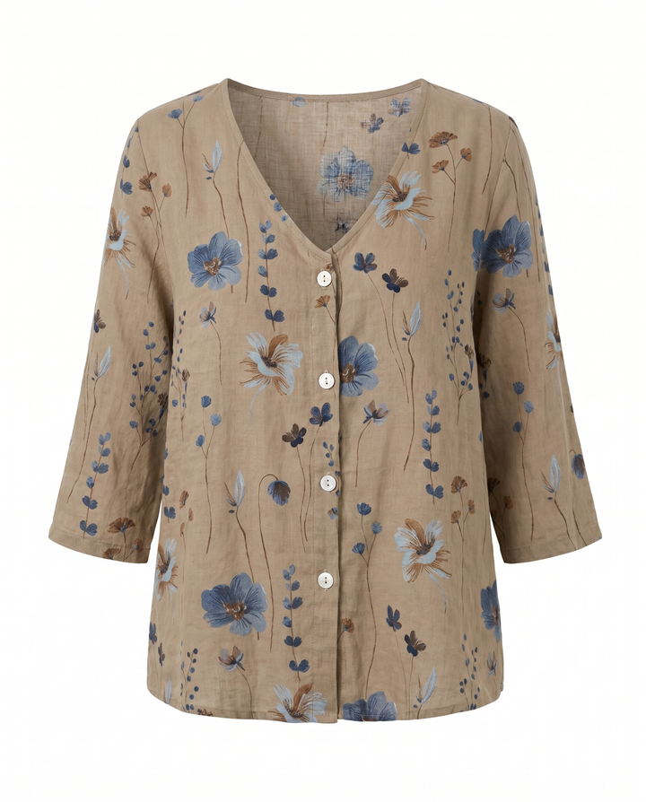 Blusa versátil floral bordada, cuello V. Para looks casuales de día o noche. Moda femenina.