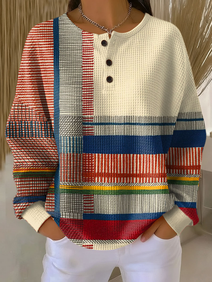 Blusa de punto waffle a rayas para mujer. Manga larga, cómoda y de moda para la primavera.