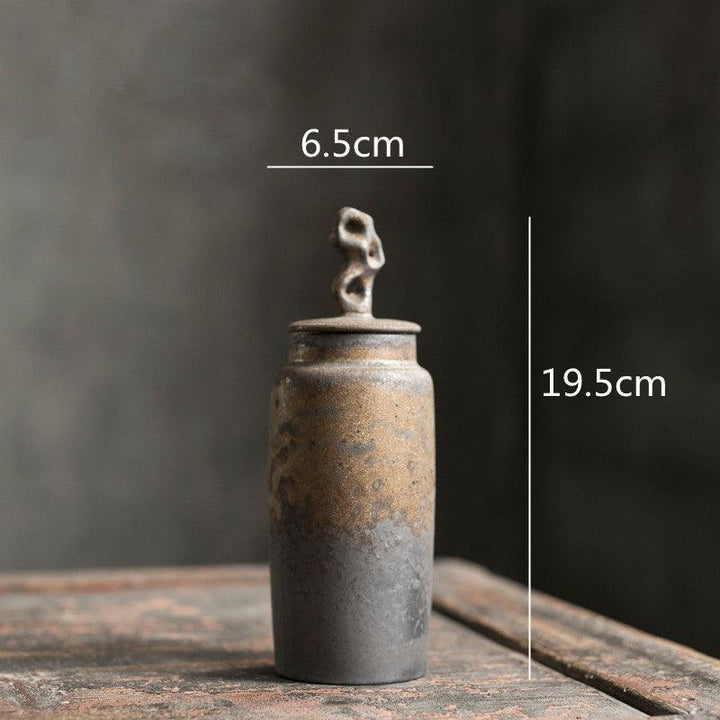 Recipiente de té artesanal de gres, estilo wabi-sabi, ideal para decoración de cocina.
