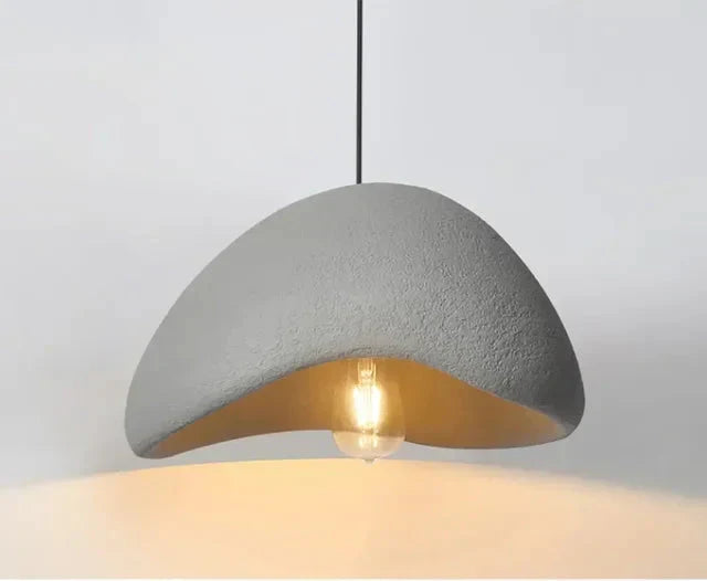 Lámpara de techo industrial moderna, diseño geométrico efecto cemento para una iluminación única.