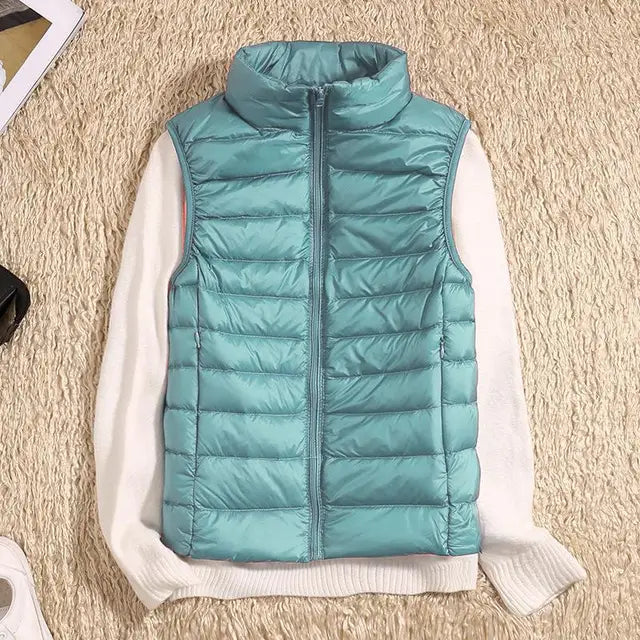 Chaleco de mujer acolchado y ultraligero, ofrece calidez y estilo para ropa exterior de otoño.