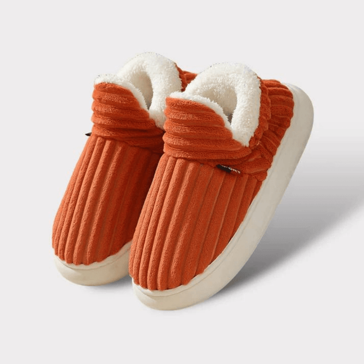 Calzado de hogar suave y antideslizante, zapatillas unisex para comodidad familiar diaria.