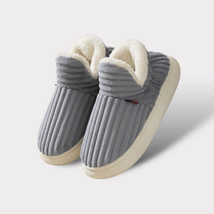 Pantuflas cómodas y relajantes, unisex, con suela antideslizante para seguridad en casa.