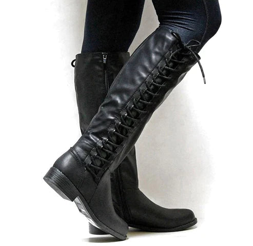 Botas altas robustas de mujer con cordones, ideales para invierno. Estilo audaz, suela antideslizante y máxima comodidad.