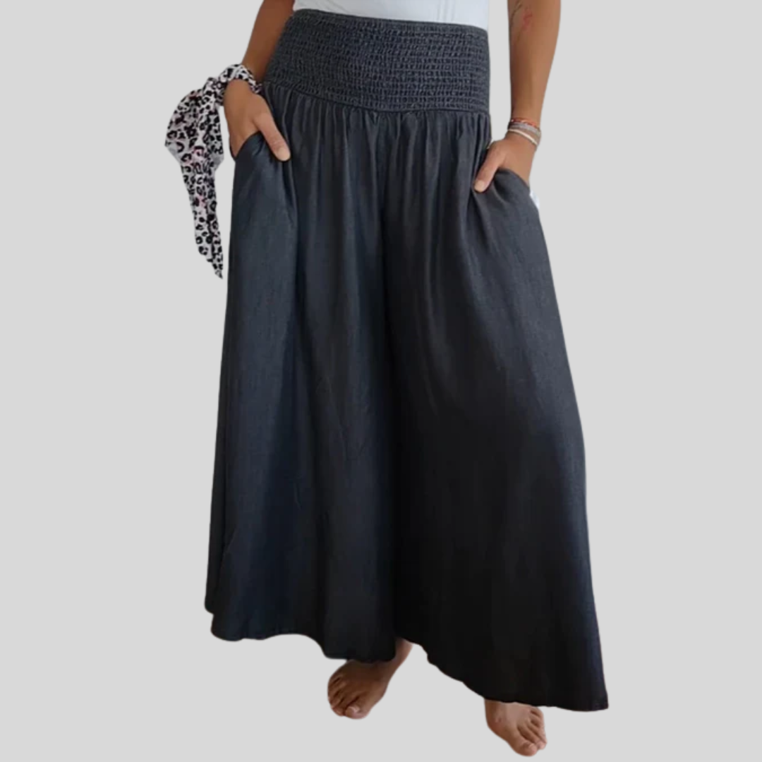 Pantalón de mujer con pierna ancha y cintura elástica. Estilo casual cómodo para verano.