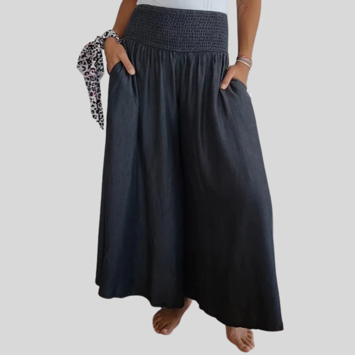 Pantalón de mujer con pierna ancha y cintura elástica. Estilo casual cómodo para verano.