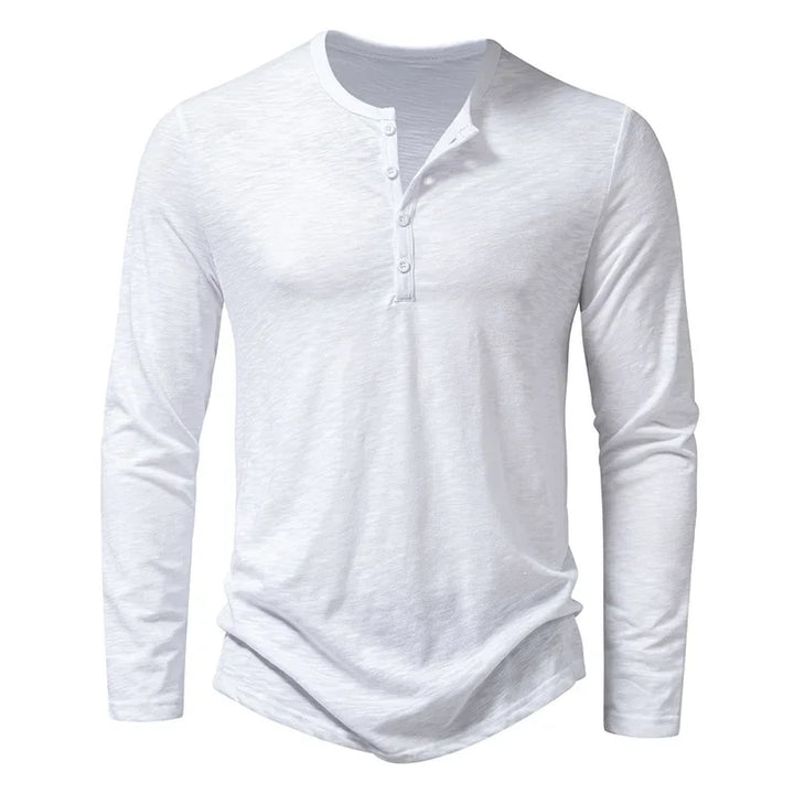 Camiseta de hombre en algodón suave, manga larga y escote abotonado. Estilo casual para primavera y otoño.