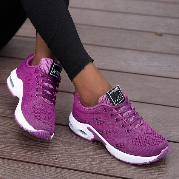 Zapatillas deportivas lila de moda para mujer, con tejido mesh y suela amortiguada, ideales para caminar con estilo.