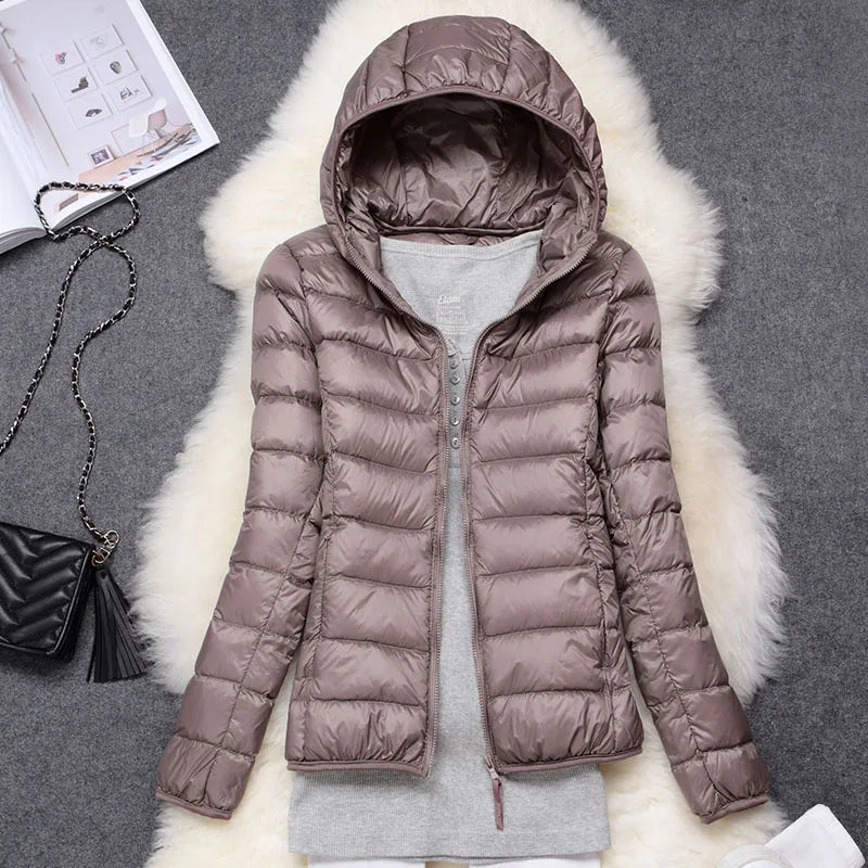 Plumífero ultraligero compacto de mujer, cálido y versátil para invierno y otoño.