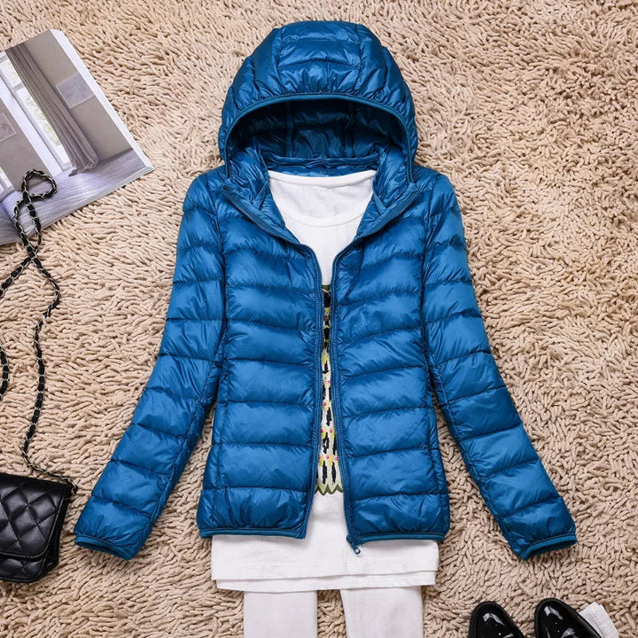 Plumífero de mujer, ultraligero y elegante. Chaqueta cálida y versátil para el frío.